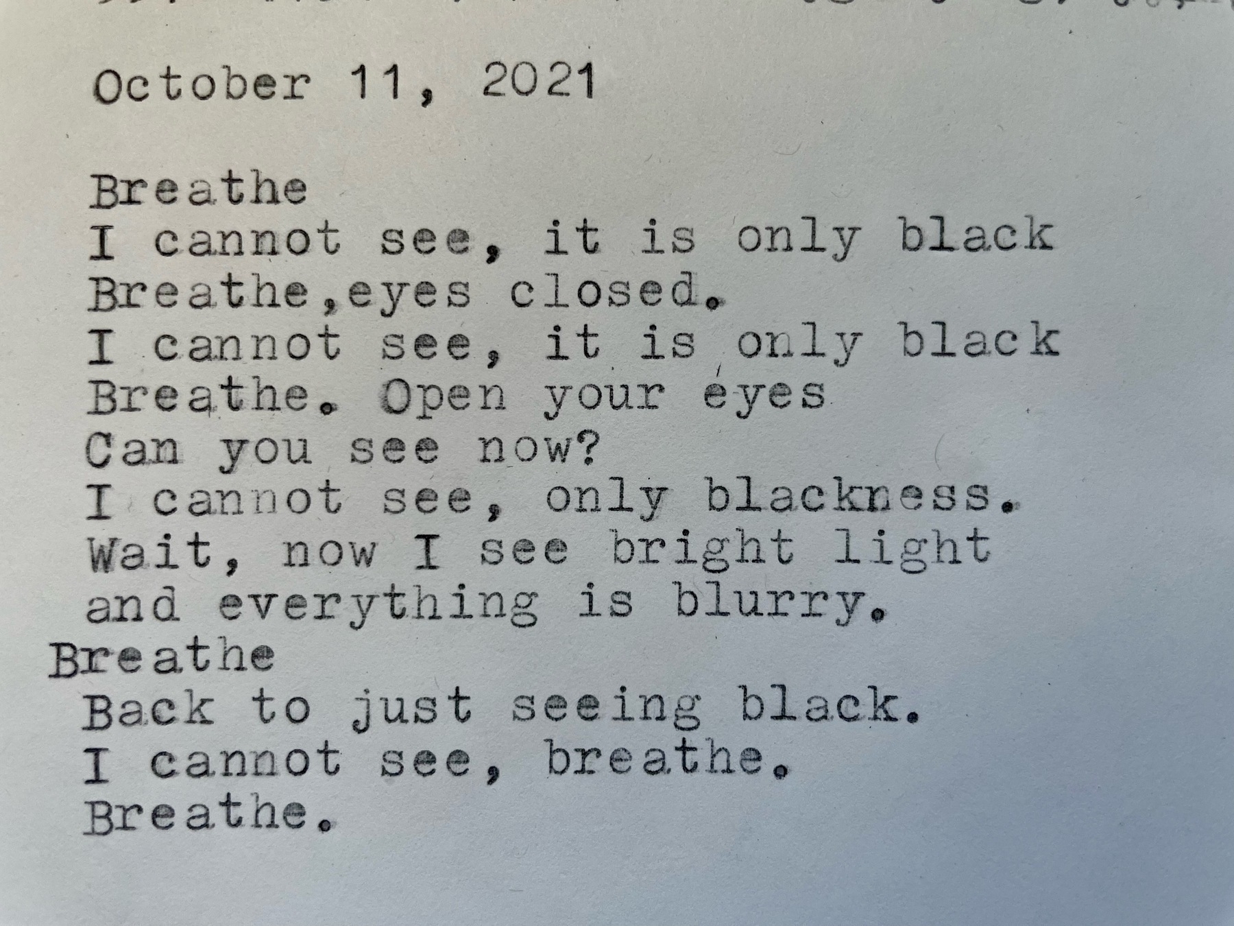 a picture of a poem, written on a typewriter
